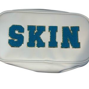 Neutrogena White Skin Travel Pouch with Blue Lettering NWT